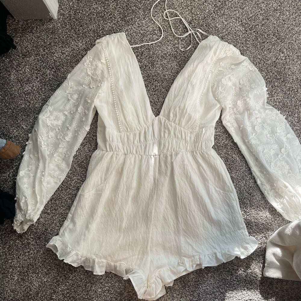 Long sleeve white romper. Perfect for the fall brides!!